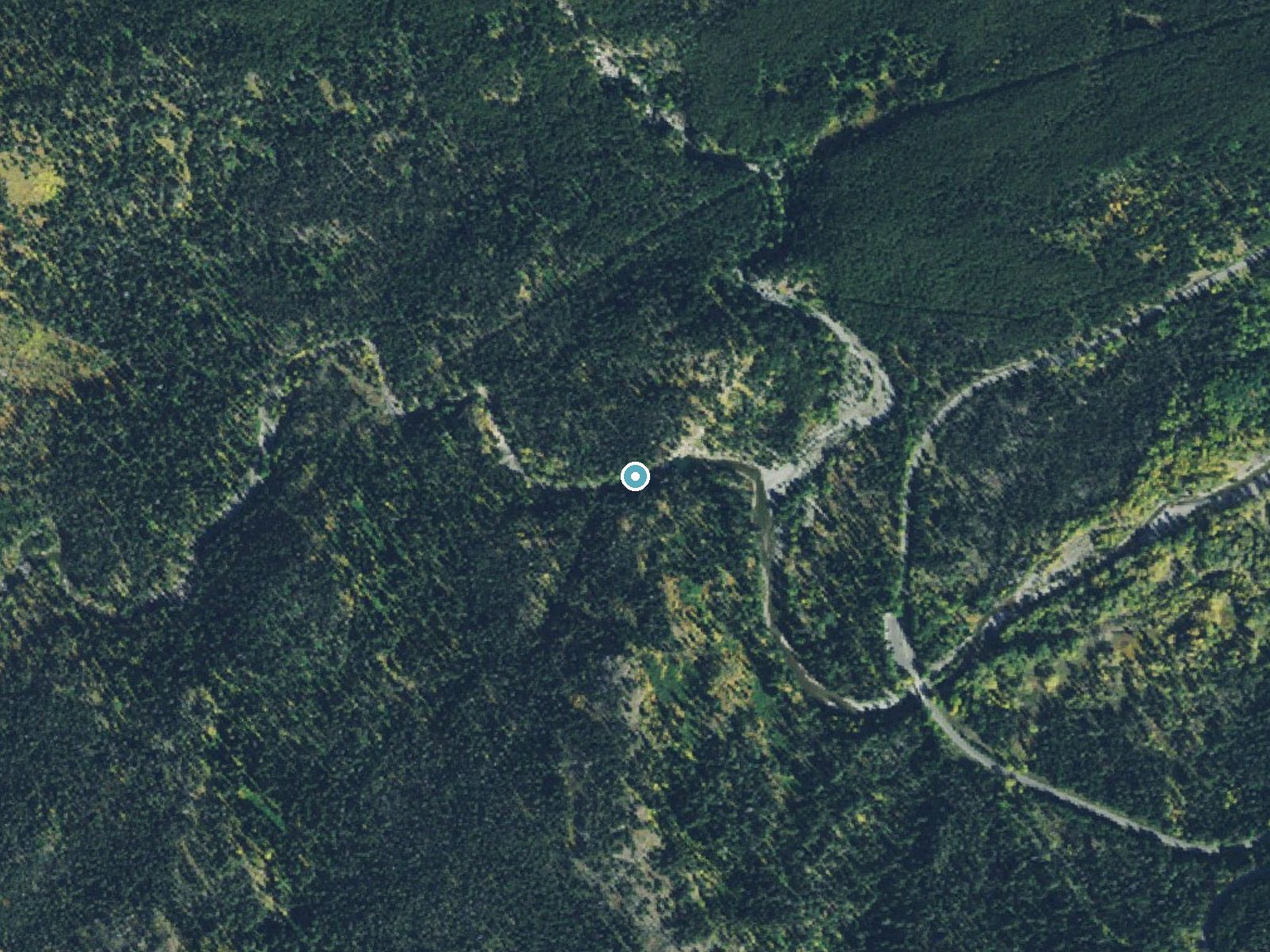 Aerial photo of the same ground around Running Eagle Falls near East Glacier Park Village, Montana, for comparison with the lidar view