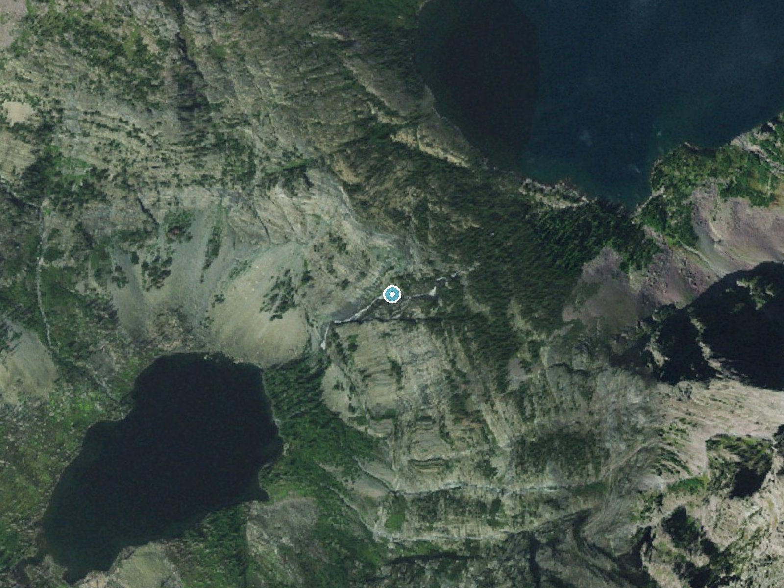 Aerial photo of the same ground around Beaver Chief Falls near West Glacier, Montana, for comparison with the lidar view