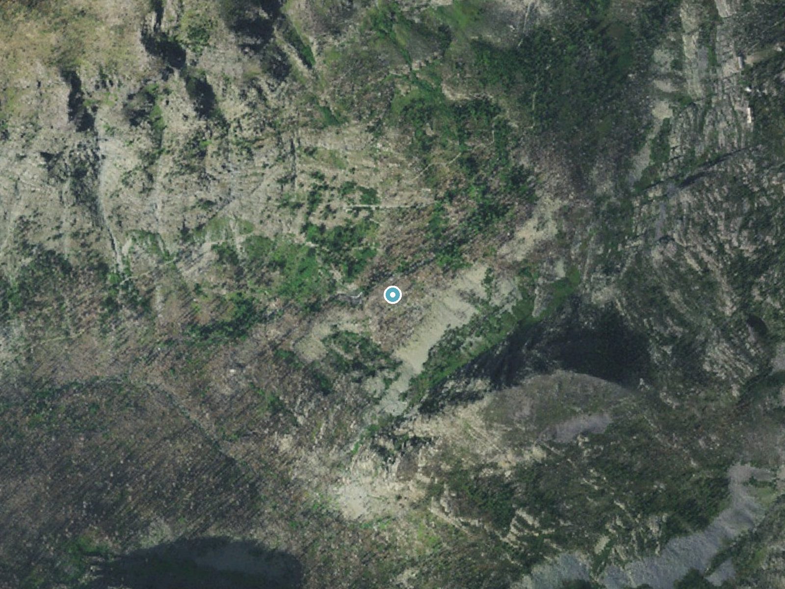 Aerial photo of the same ground around Beaver Medicine Falls near West Glacier, Montana, for comparison with the lidar view