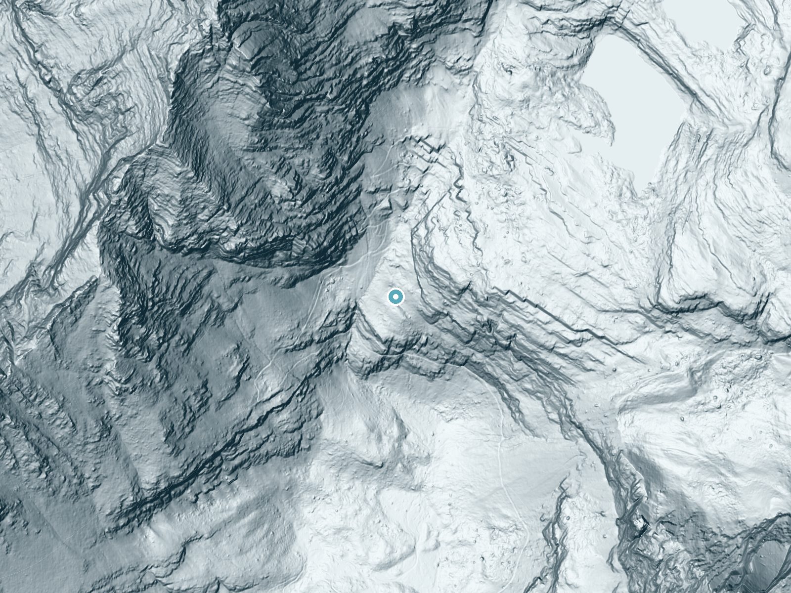 LiDAR bare-earth terrain around Akaiyan Falls near West Glacier, Montana, showing about 261 feet of drop, a steep tiered drop, facing southwest