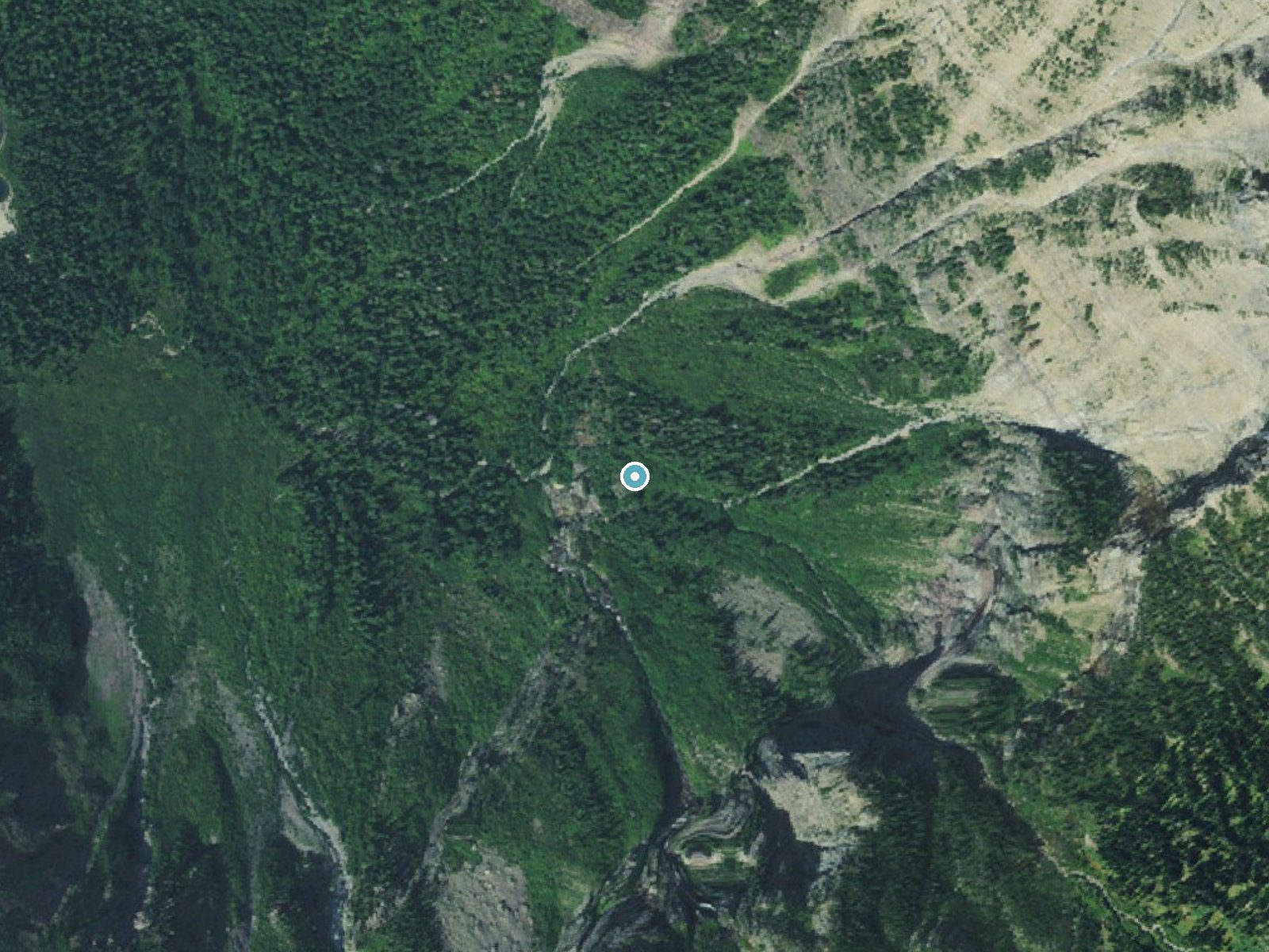 Aerial photo of the same ground around Monument Falls near West Glacier, Montana, for comparison with the lidar view