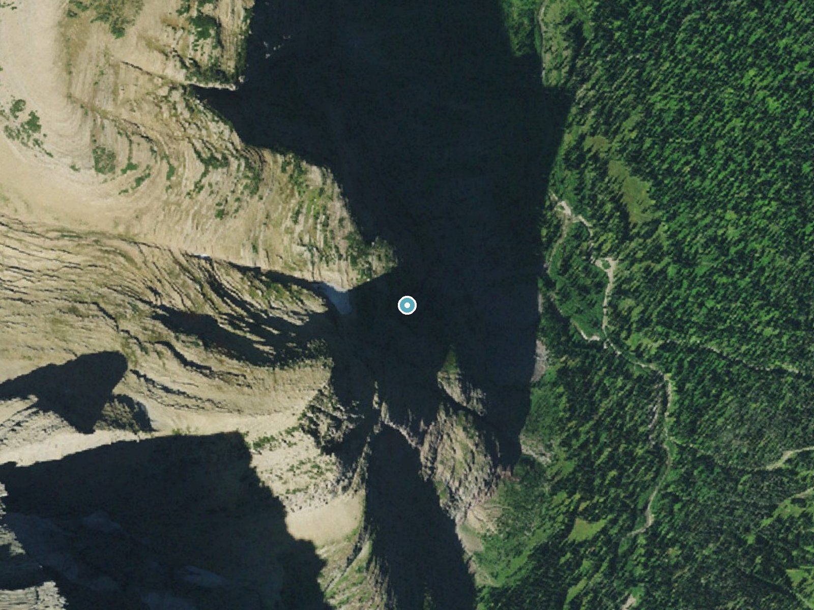 Aerial photo of the same ground around Feather Plume Falls near Saint Mary, Montana, for comparison with the lidar view