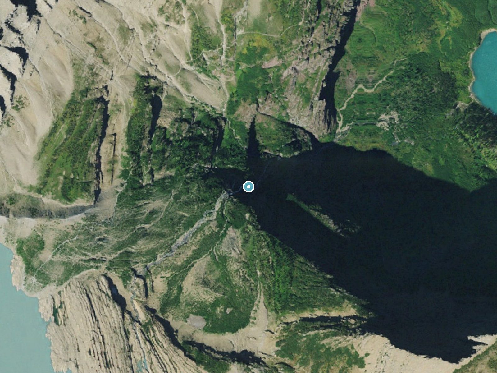 Aerial photo of the same ground around Grinnell Falls near Saint Mary, Montana, for comparison with the lidar view