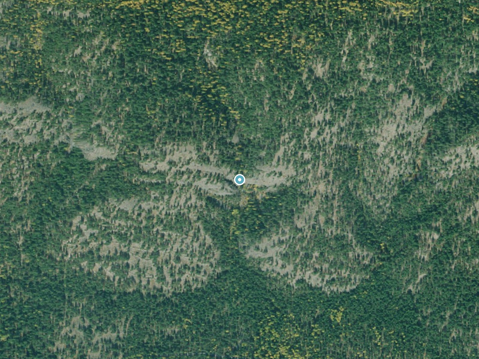 Aerial photo of the same ground around Sutton Creek Falls near Rexford, Montana, for comparison with the lidar view