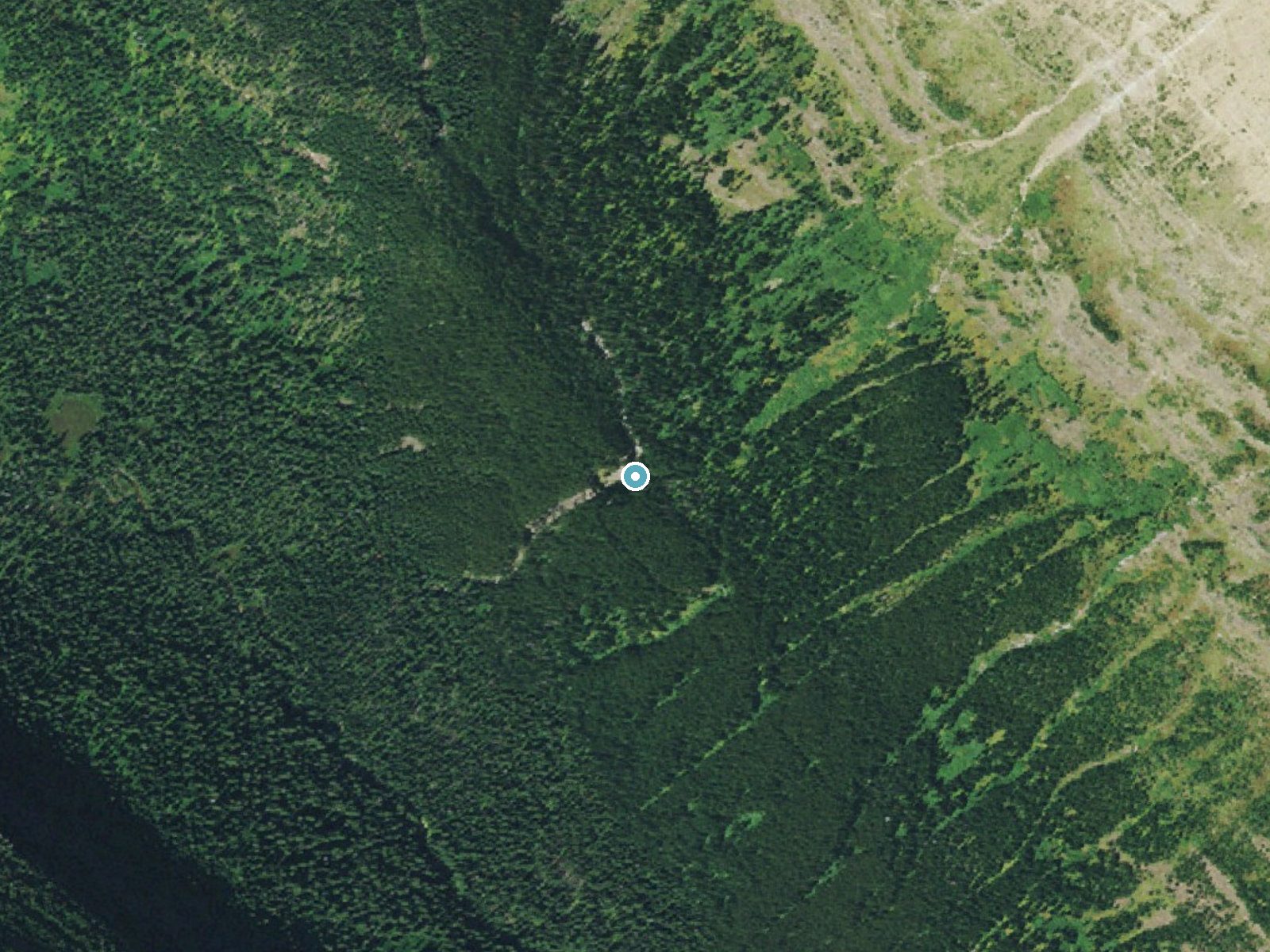 Aerial photo of the same ground around Ptarmigan Falls near Babb, Montana, for comparison with the lidar view