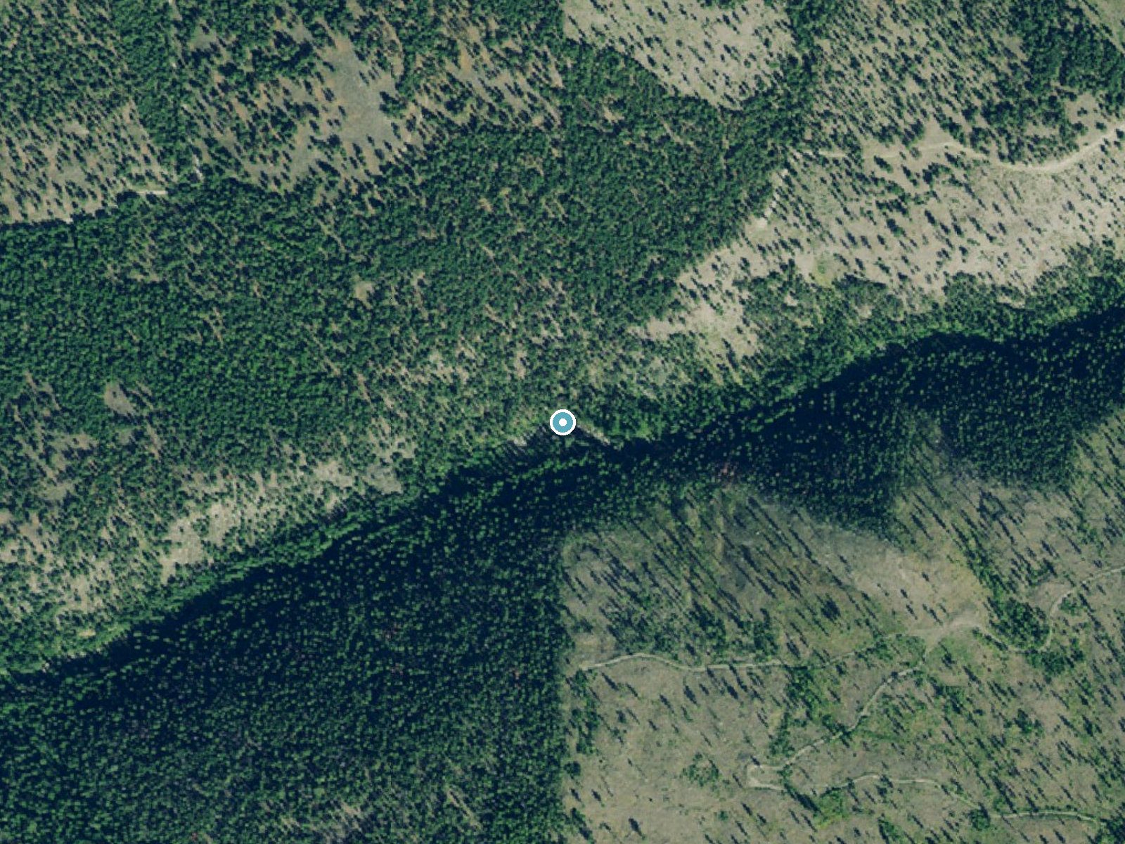 Aerial photo of the same ground around Pinkham Falls near Rexford, Montana, for comparison with the lidar view