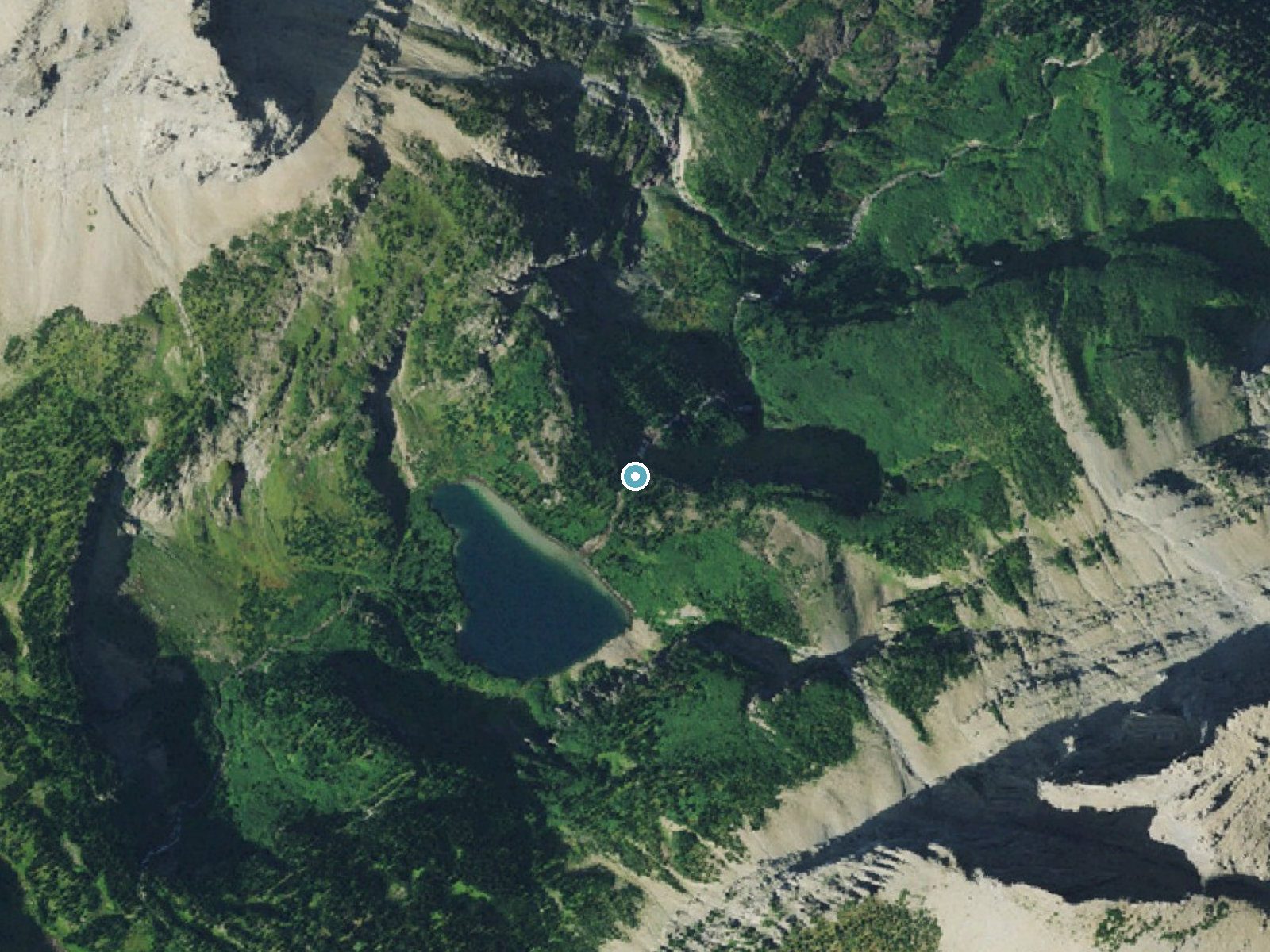 Aerial photo of the same ground around Mokowanis Cascade near Babb, Montana, for comparison with the lidar view