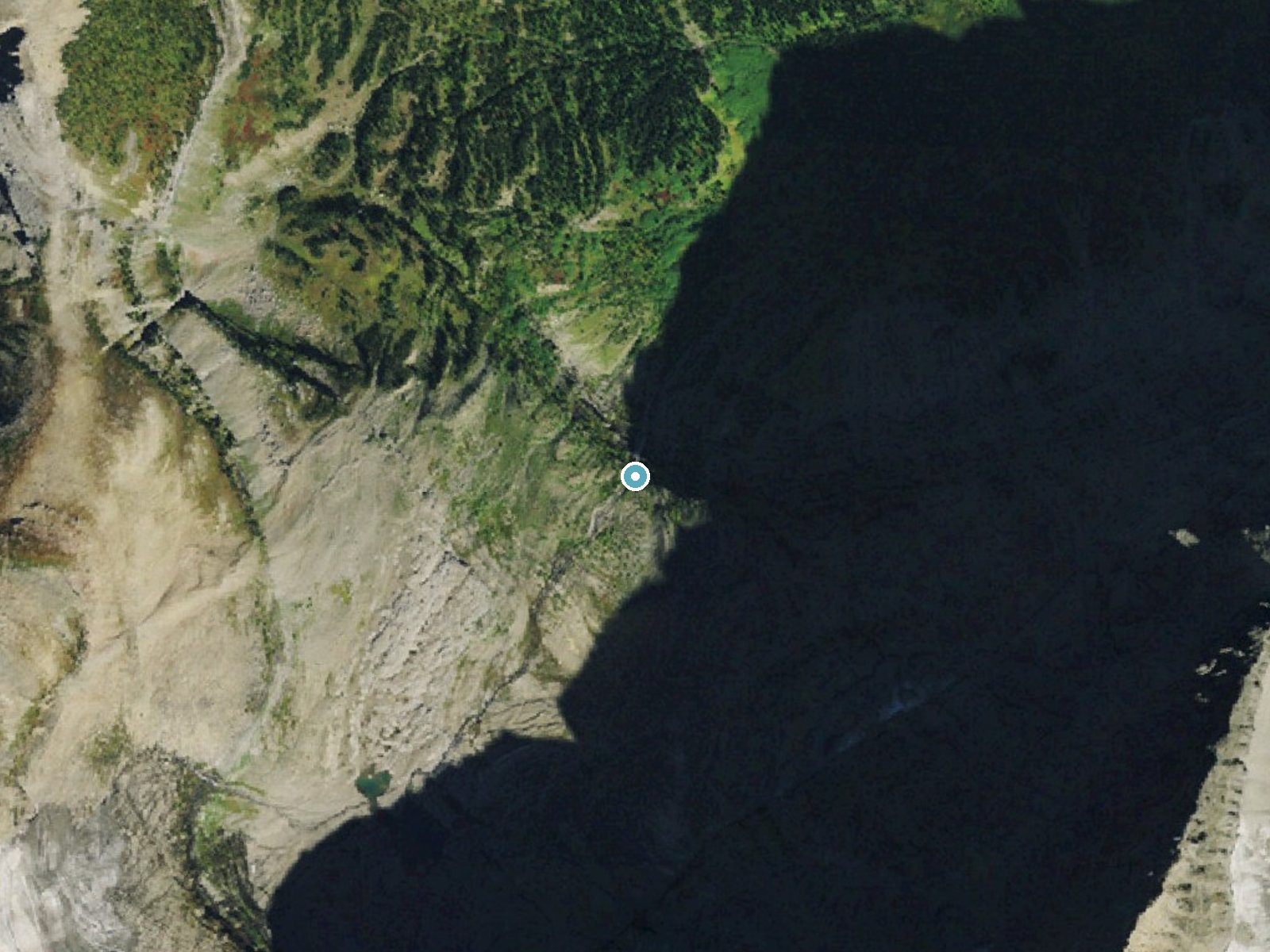 Aerial photo of the same ground around Thunderbird Falls near Polebridge, Montana, for comparison with the lidar view
