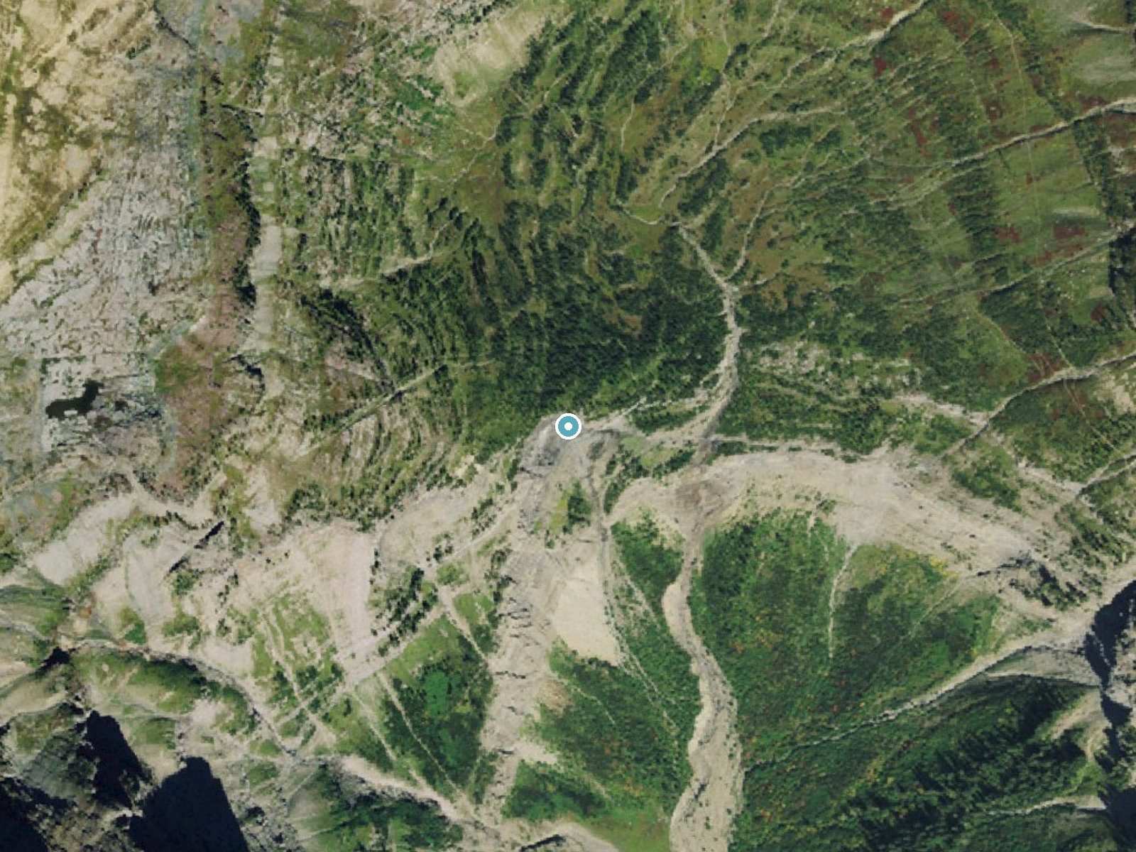 Aerial photo of the same ground around Hole-in-the Wall Falls near Polebridge, Montana, for comparison with the lidar view