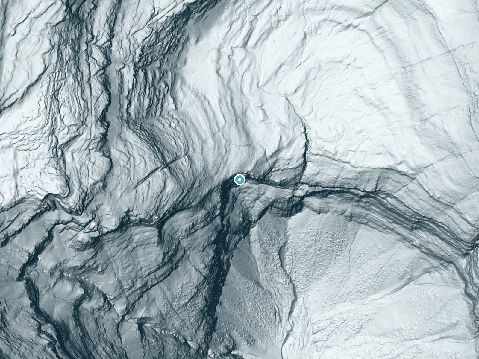 LiDAR bare-earth terrain around Hole-in-the Wall Falls near Polebridge, Montana, showing about 843 feet of drop, a single sheer drop, facing south