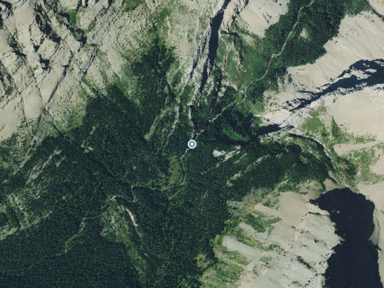 Aerial photo of the same ground around Miche Wabun Falls near Babb, Montana, for comparison with the lidar view