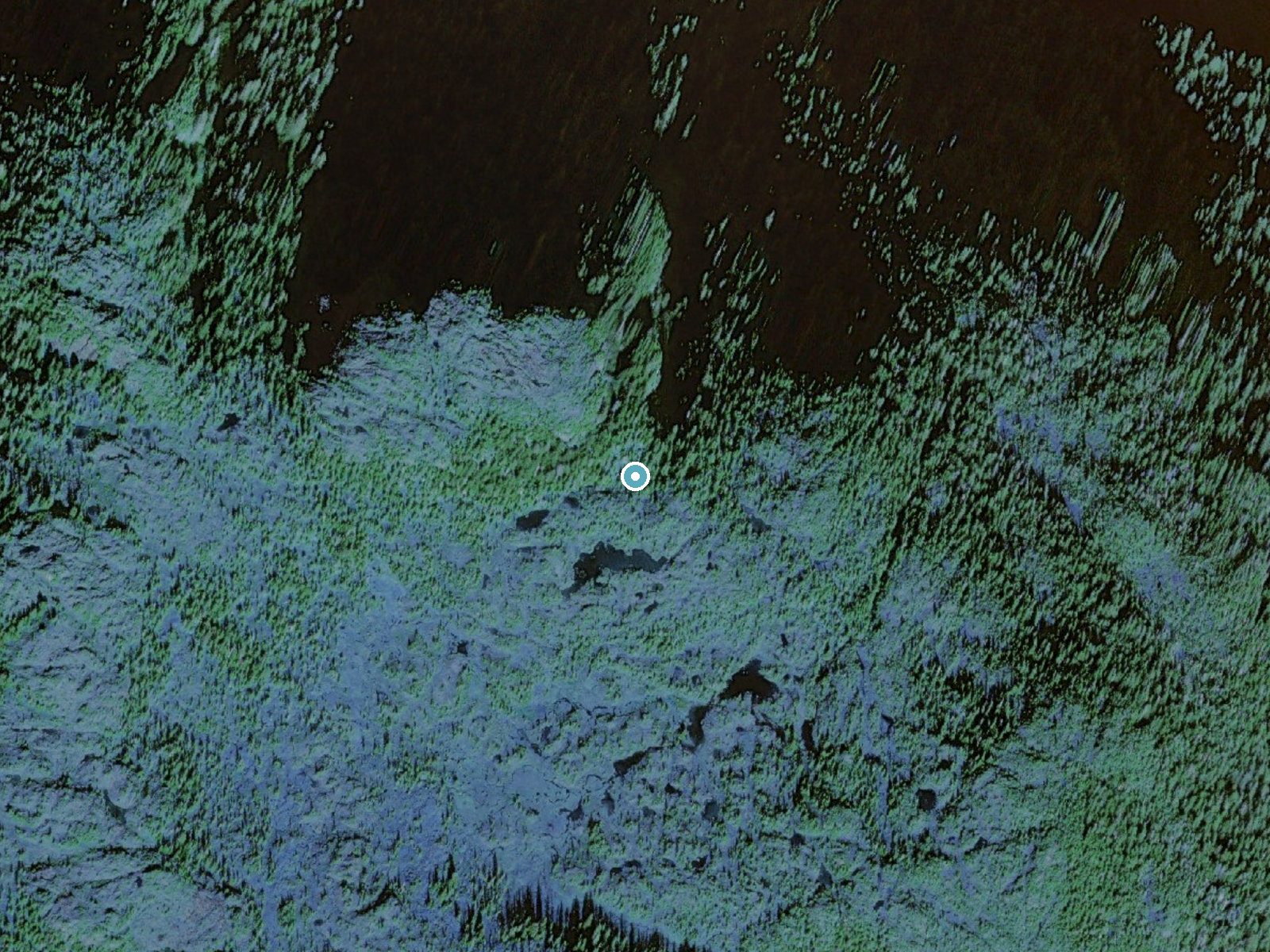 Aerial view of the ground around Wolf Pass Falls near Coffman Cove, Alaska